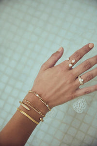 Small Daisy Link Bracelet in Gold by LILI CLASPE